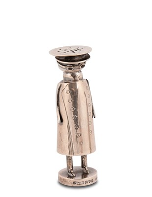 Lot 64 - An Edwardian 'Mr Popple' silver pepper pot