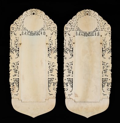Lot 641 - A pair of carved ivory letter racks