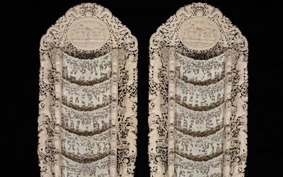 Lot 641 - A pair of carved ivory letter racks