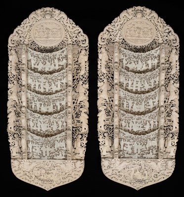 Lot 641 - A pair of carved ivory letter racks