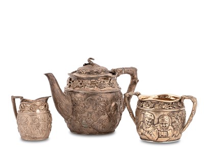 Lot 70 - A Victorian three-piece silver-gilt tea set