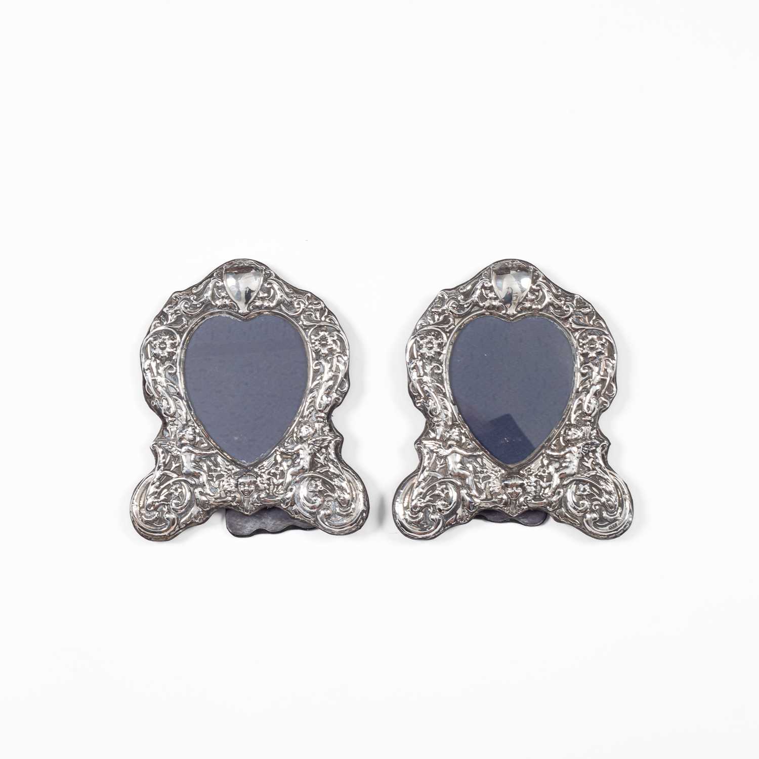 Lot 26 - A pair of silver mounted photograph frames