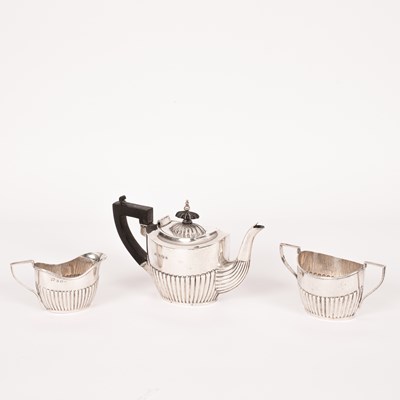 Lot 30 - An Edwardian three-piece silver bachelor's tea set