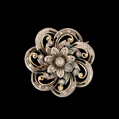 Lot 174 - A yellow metal diamond flower brooch