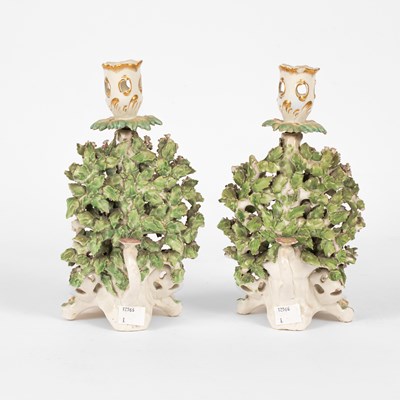 Lot 534 - A pair of Derby candlesticks