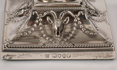 Lot 10 - A pair of Victorian silver mounted candlesticks