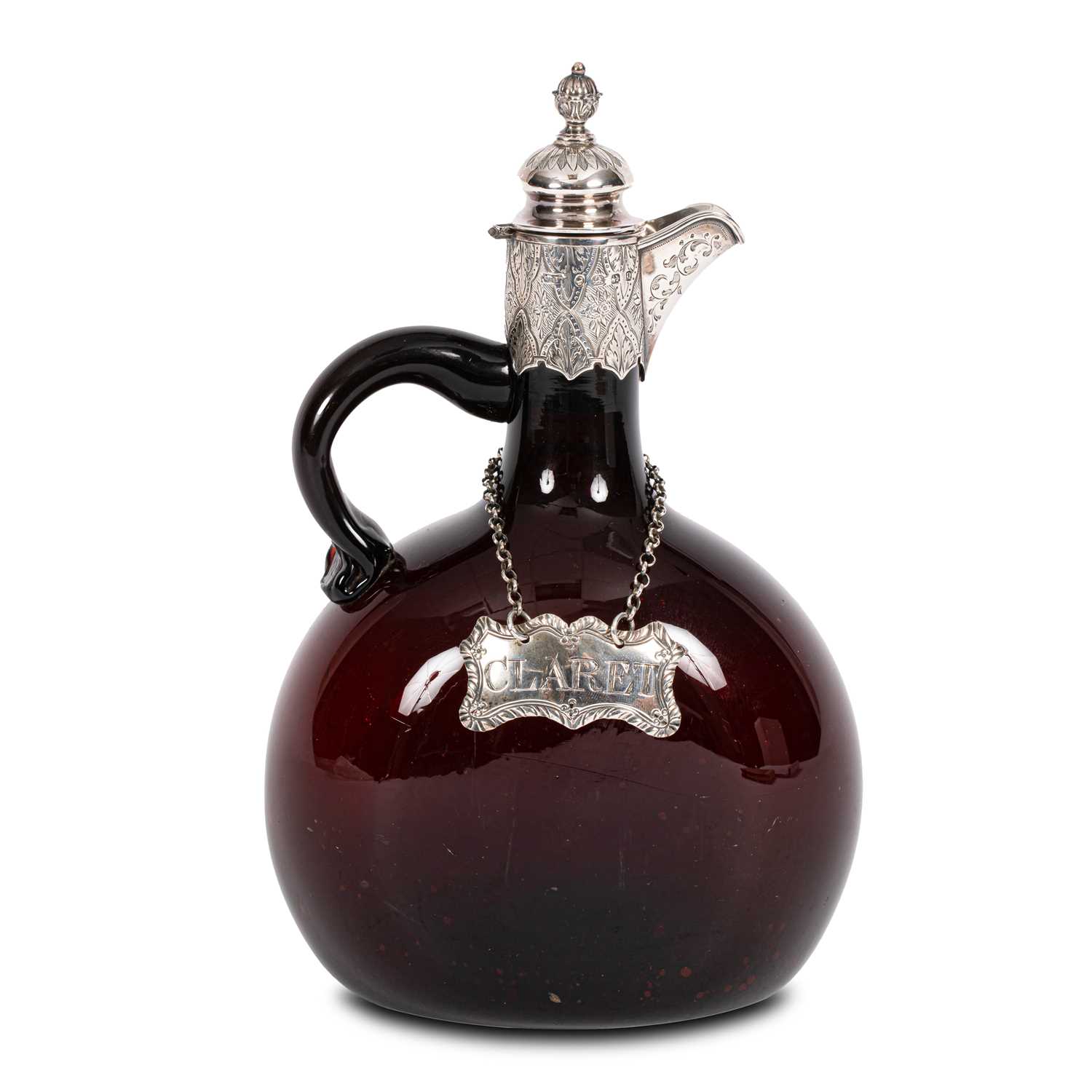 Lot 11 - A Victorian ruby glass and silver mounted claret jug
