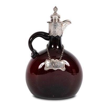 Lot 11 - A Victorian ruby glass and silver mounted claret jug