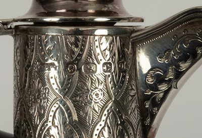 Lot 11 - A Victorian ruby glass and silver mounted claret jug