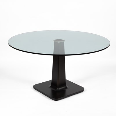 Lot 135 - A circular glass topped table