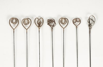 Lot 25 - An Edwardian Art Nouveau gold plated and brass hatpin