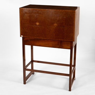 Lot 124 - Ernest Gimson (1864-1919) A writing cabinet on stand