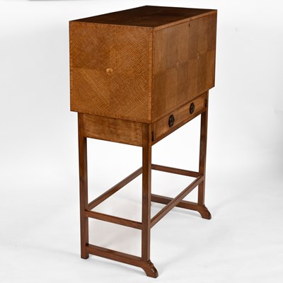 Lot 124 - Ernest Gimson (1864-1919) A writing cabinet on stand