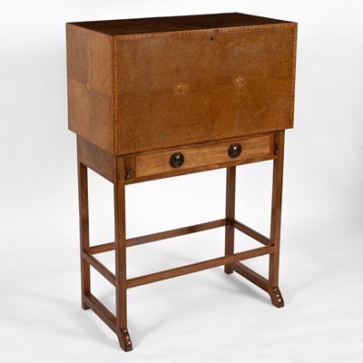 Lot 124 - Ernest Gimson (1864-1919) A writing cabinet on stand