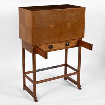 Lot 124 - Ernest Gimson (1864-1919) A writing cabinet on stand