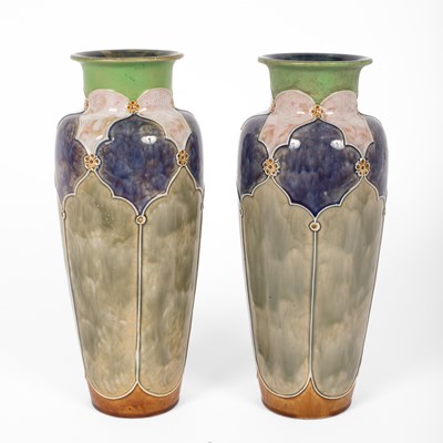 Lot 459 - A near pair of Art Nouveau Royal Doulton stoneware baluster vases