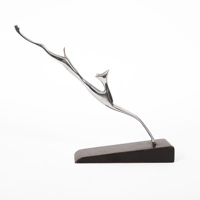 Lot 522 - Hagenauer, a silvered metal stylised figure of a leaping gazelle