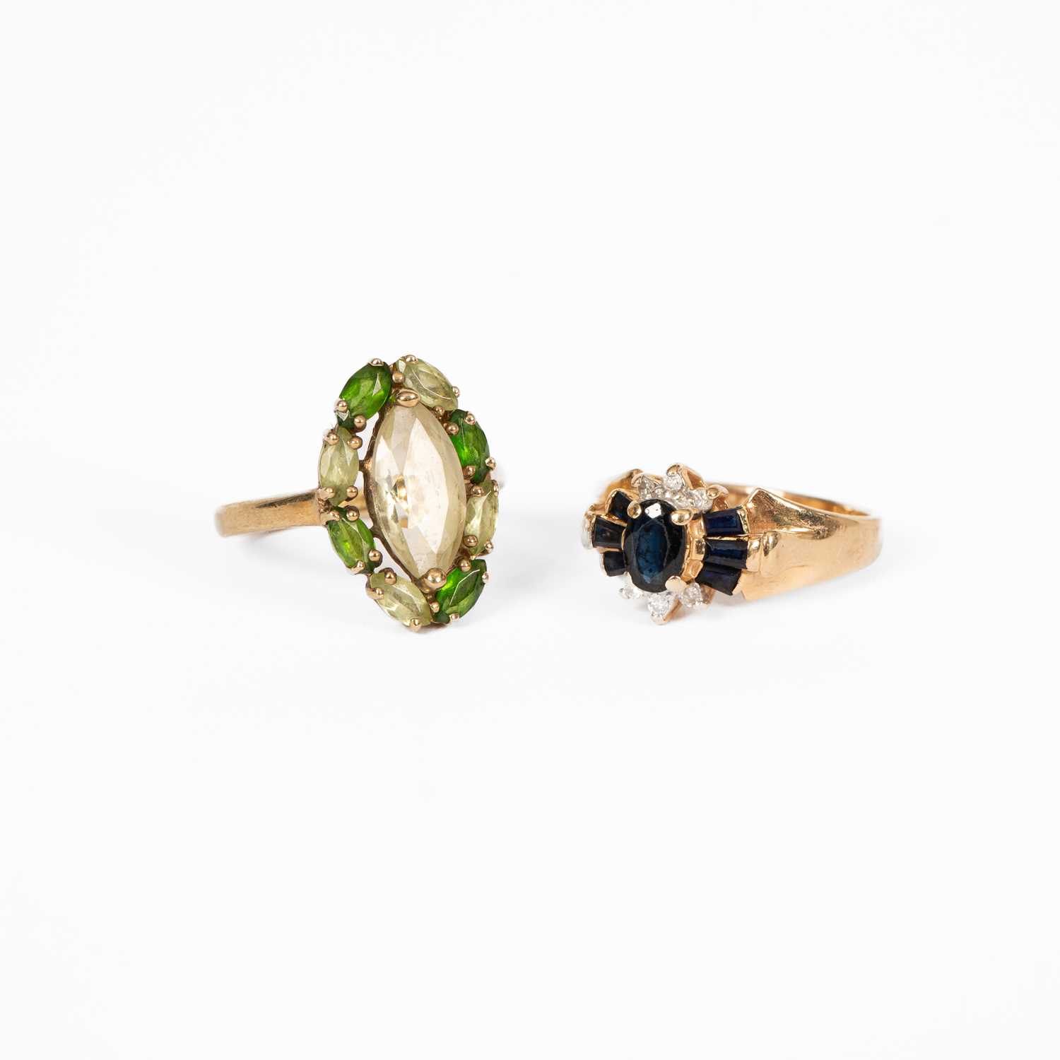 Lot 3 - Two yellow metal gem set rings