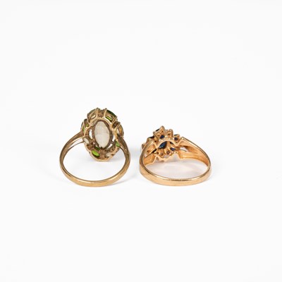 Lot 3 - Two yellow metal gem set rings