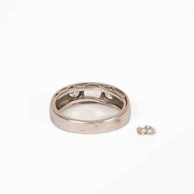 Lot 1 - A platinum and diamond three stone ring