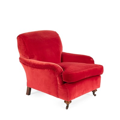 Lot 32 - A red upholstered armchair