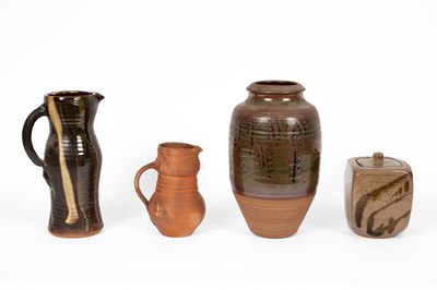 Lot 427 - A Winchcombe Pottery treacle glaze jug