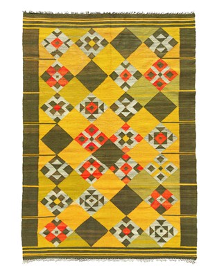 Lot 543 - An Eastern European kilim rug