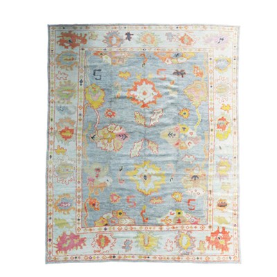 Lot 548 - A contemporary part Angora Ushak carpet