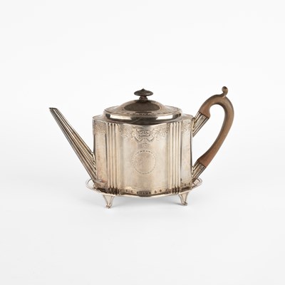 Lot 73 - A George III silver teapot on stand