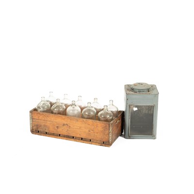 Lot 537 - An antique crate fitted with ten glass bottles
