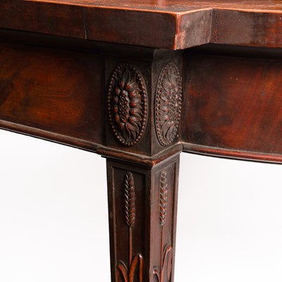Lot 371 - A George III mahogany serving table of serpentine outline