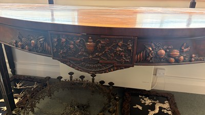 Lot 371 - A George III mahogany serving table of serpentine outline