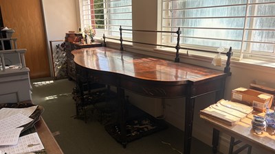 Lot 371 - A George III mahogany serving table of serpentine outline