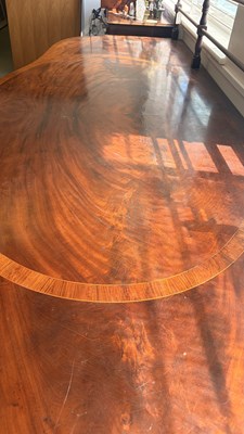 Lot 371 - A George III mahogany serving table of serpentine outline