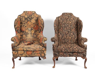 Lot 801 - A pair of upholstered wingback armchairs of Queen Anne design
