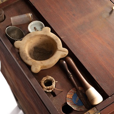 Lot 183 - A George III apothecary’s mahogany cabinet
