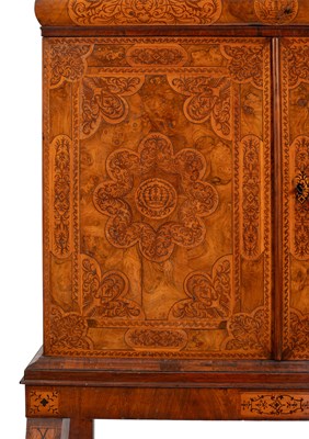 Lot 45 - A 17th Century walnut seaweed marquetry cabinet
