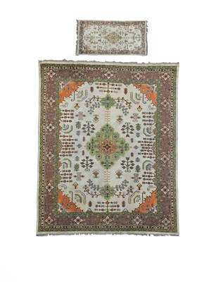 Lot 300 - An Indian carpet of Ushak design