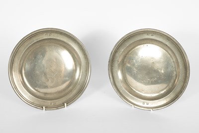 Lot 40 - A pair of English pewter reeded plates by Robert Jupe of London