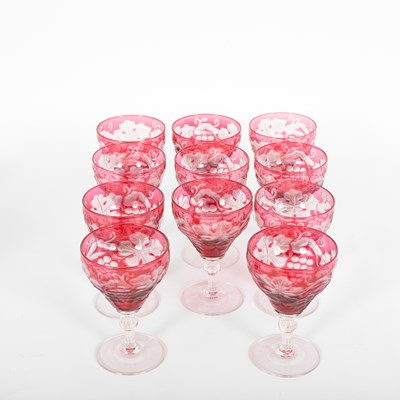 Lot 1223 - A suite of cranberry stained glassware