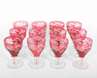 Lot 1223 - A suite of cranberry stained glassware