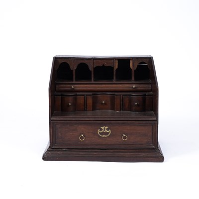 Lot 794 - A country made oak table top bureau