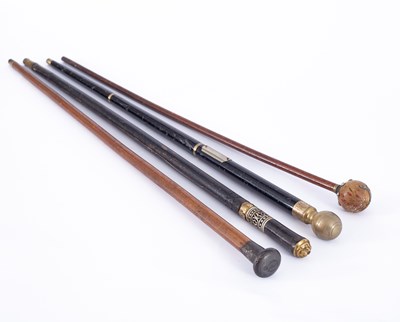 Lot 1230 - Four early 20th Century walking sticks