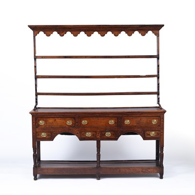 Lot 861 - A George III oak and inlaid dresser