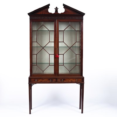 Lot 864 - A mahogany display unit cabinet