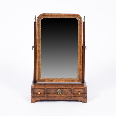 Lot 867 - A George I walnut swing frame toilet mirror