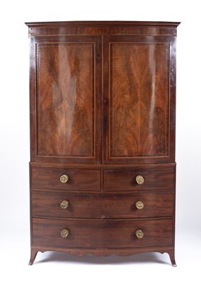 Lot 868 - A Regency mahogany bowfront linen press