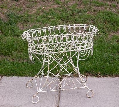 Lot 832 - A white-painted wirework plant stand