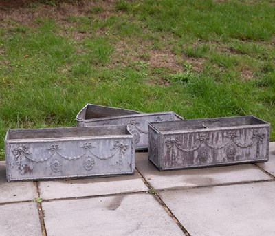 Lot 833 - Three embossed rectangular lead planters