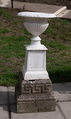 Lot 835 - A cast iron campana-shaped jardinière